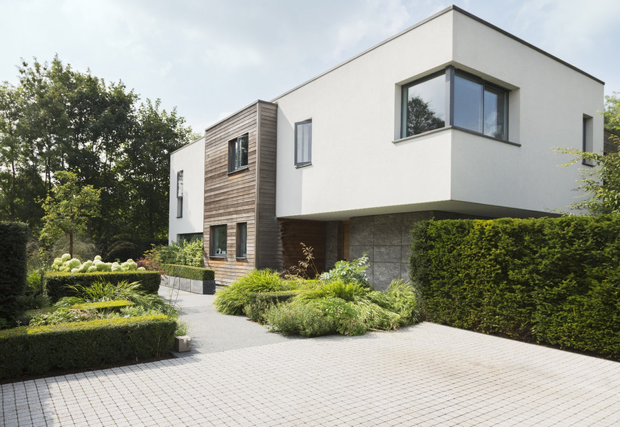 Modern home with a clean white rendered exterior